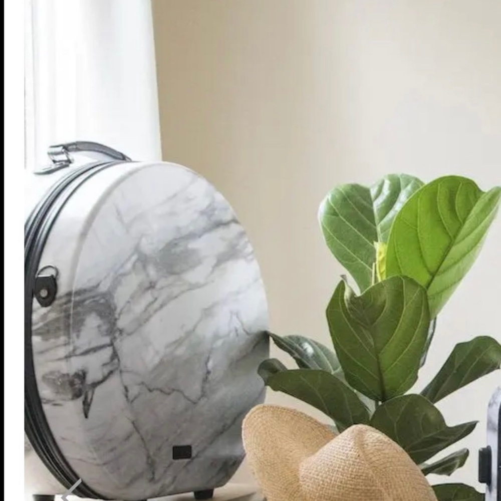 Calpak White and gray marble Round hat Suitcase